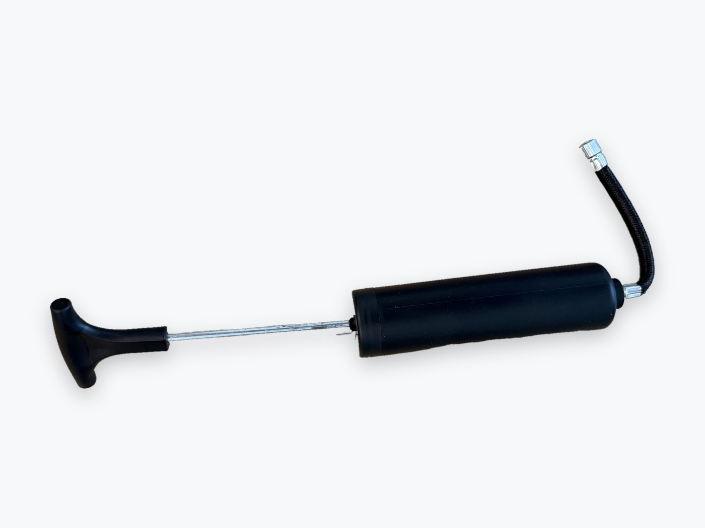 The hand air pump included with the Chairball set